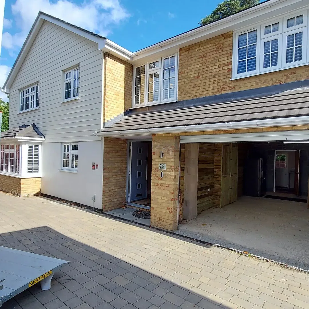 Removal van ramp down at a modern London home on moving day