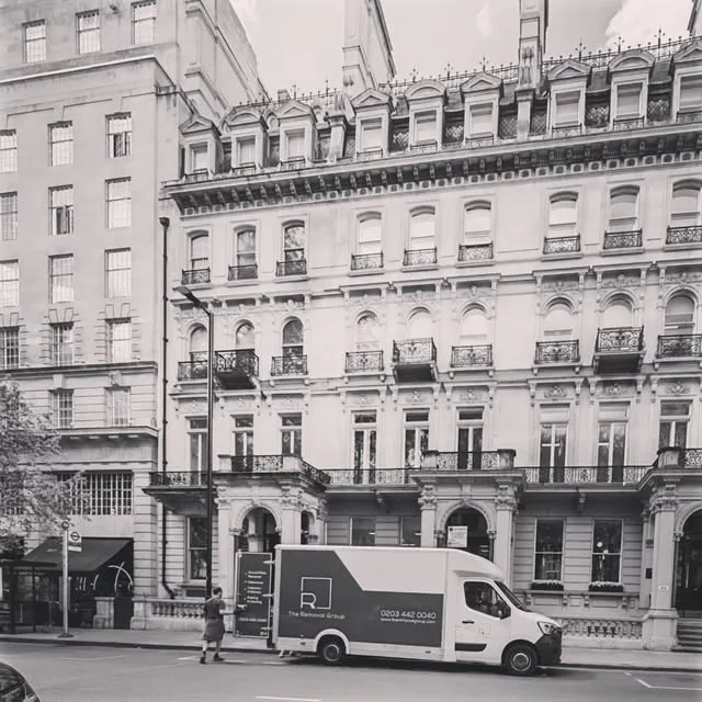 Removal van outside a grand London mansion block