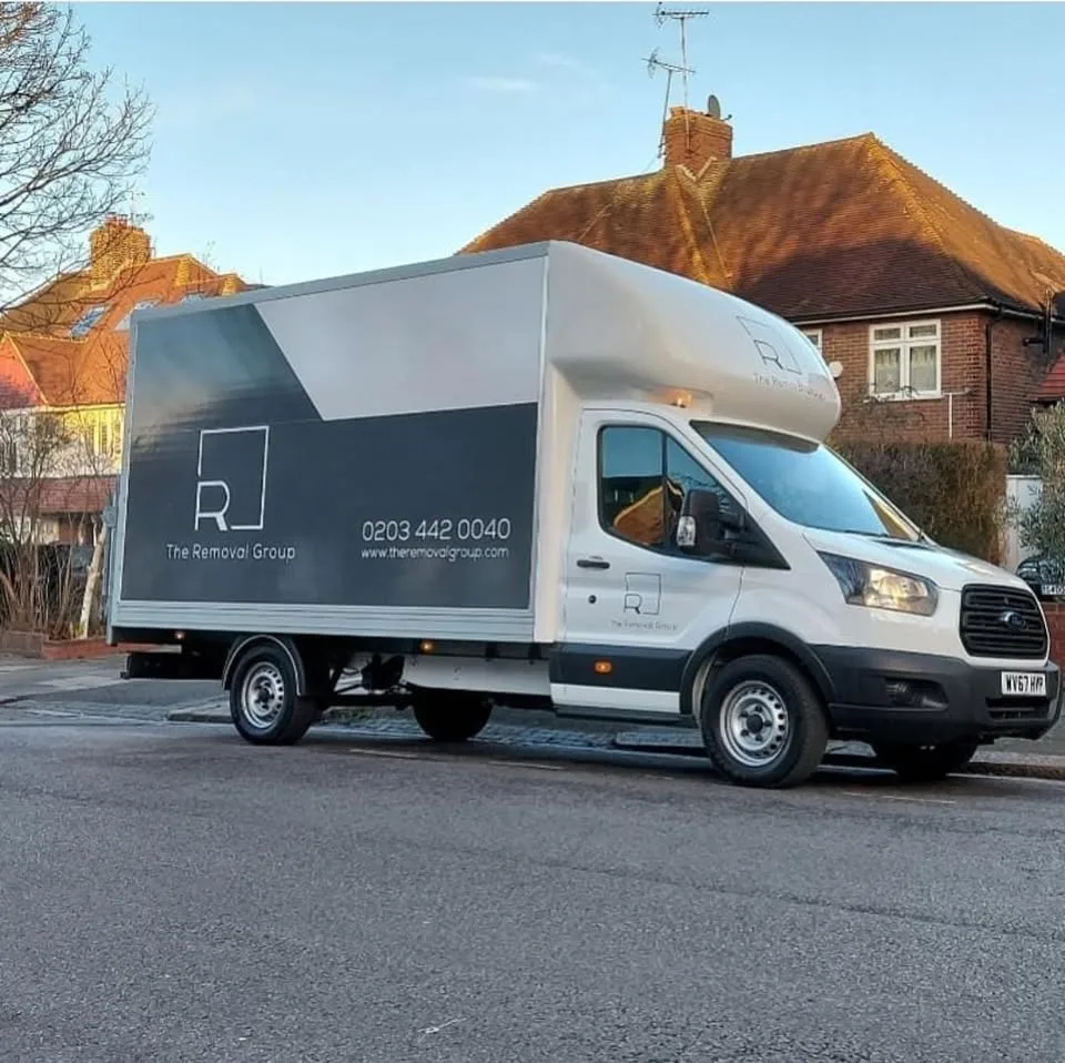 Removal van outside a suburban London house move